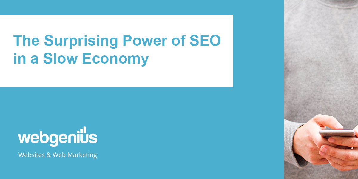 Blue banner with image of hands using a mobile device. Heading "The Surprising Power of SEO in a slow economy"